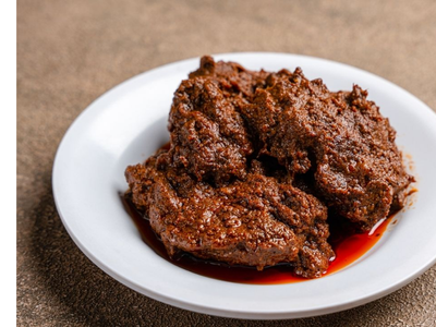 Traditional Indonesian Rendang beef stew with rich coconut curry sauce