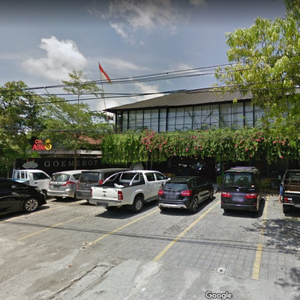 Cozy restaurant atmosphere with customers enjoying meals in warm lighting